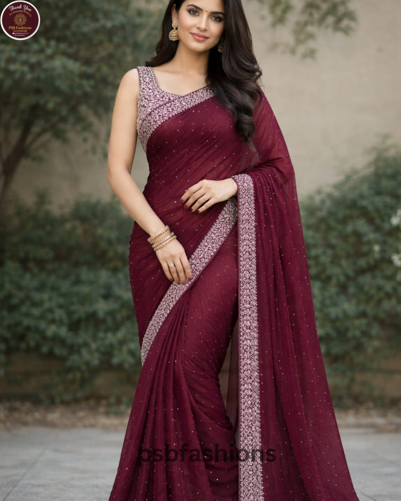 Elegant wine-maroon chiffon saree adorned with subtle shimmer